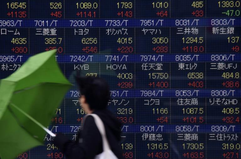 World stocks end their advance as oil rally falters